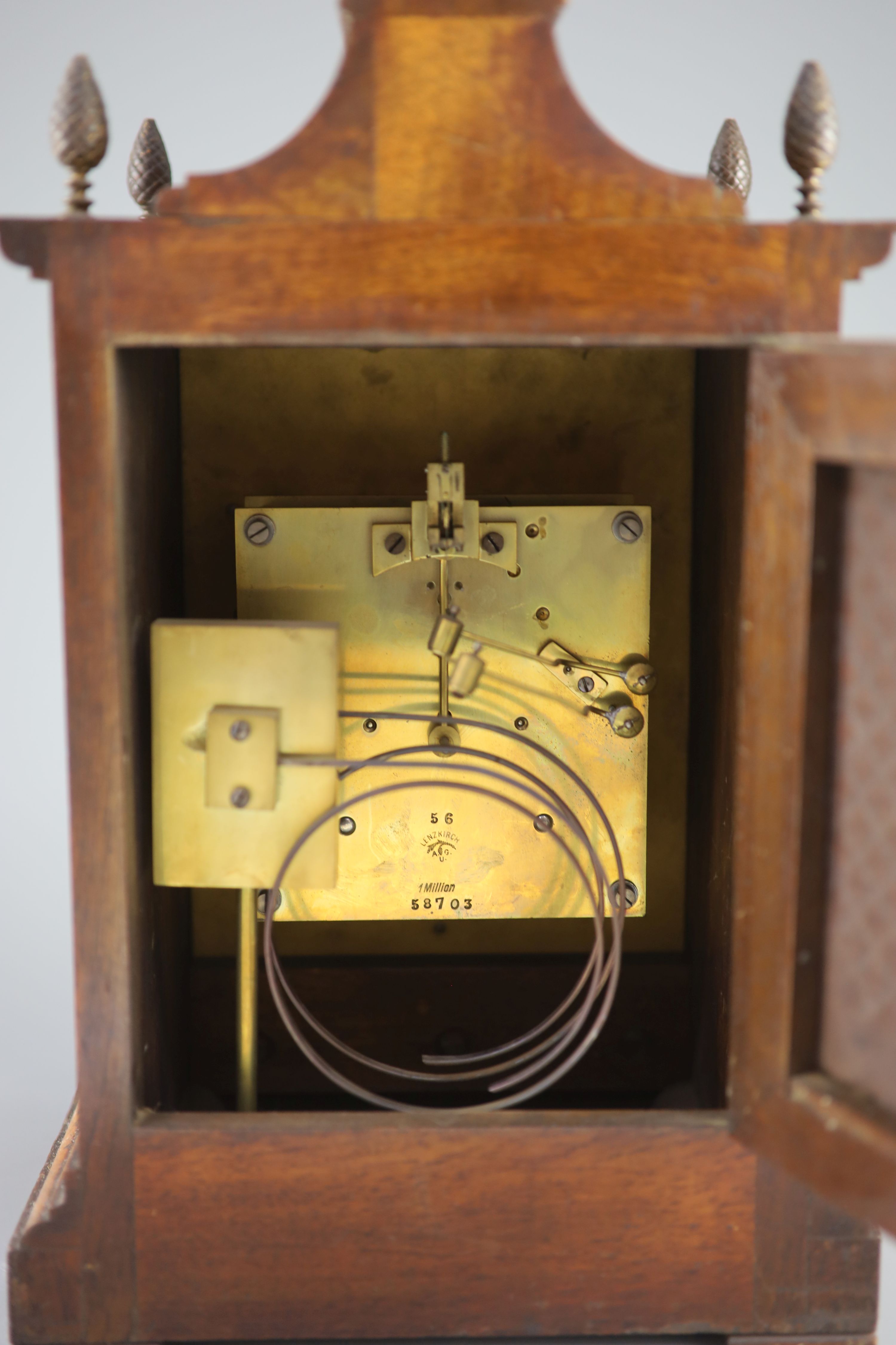 A late 19th century walnut cased bracket clock, 38cm high